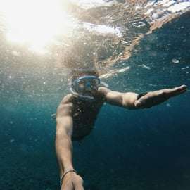 Positano: tour in barca condiviso di Capri e Grotta Azzurra con bevande